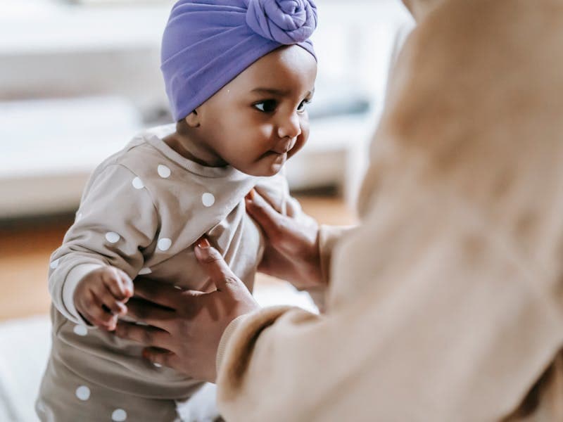 Baby sleeping on their side