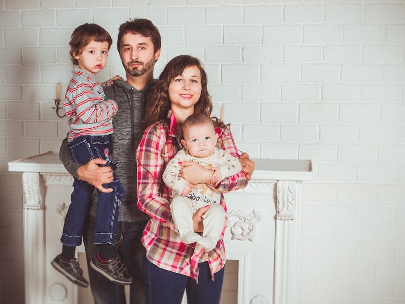 Parent holding baby at the end of a long day