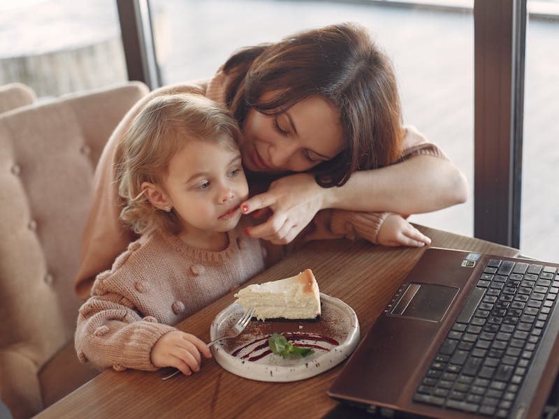 Parent soothing their baby