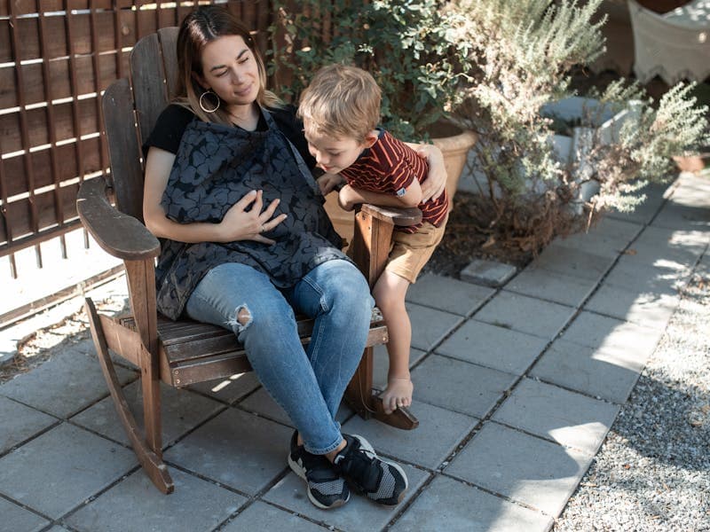Toddler sleeping in a big bed